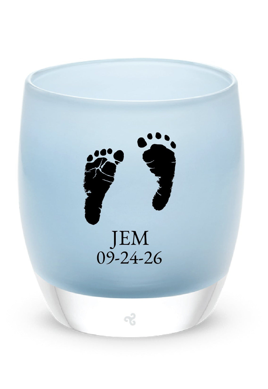 Glassybaby tea light holder with footprints and text on a white background
