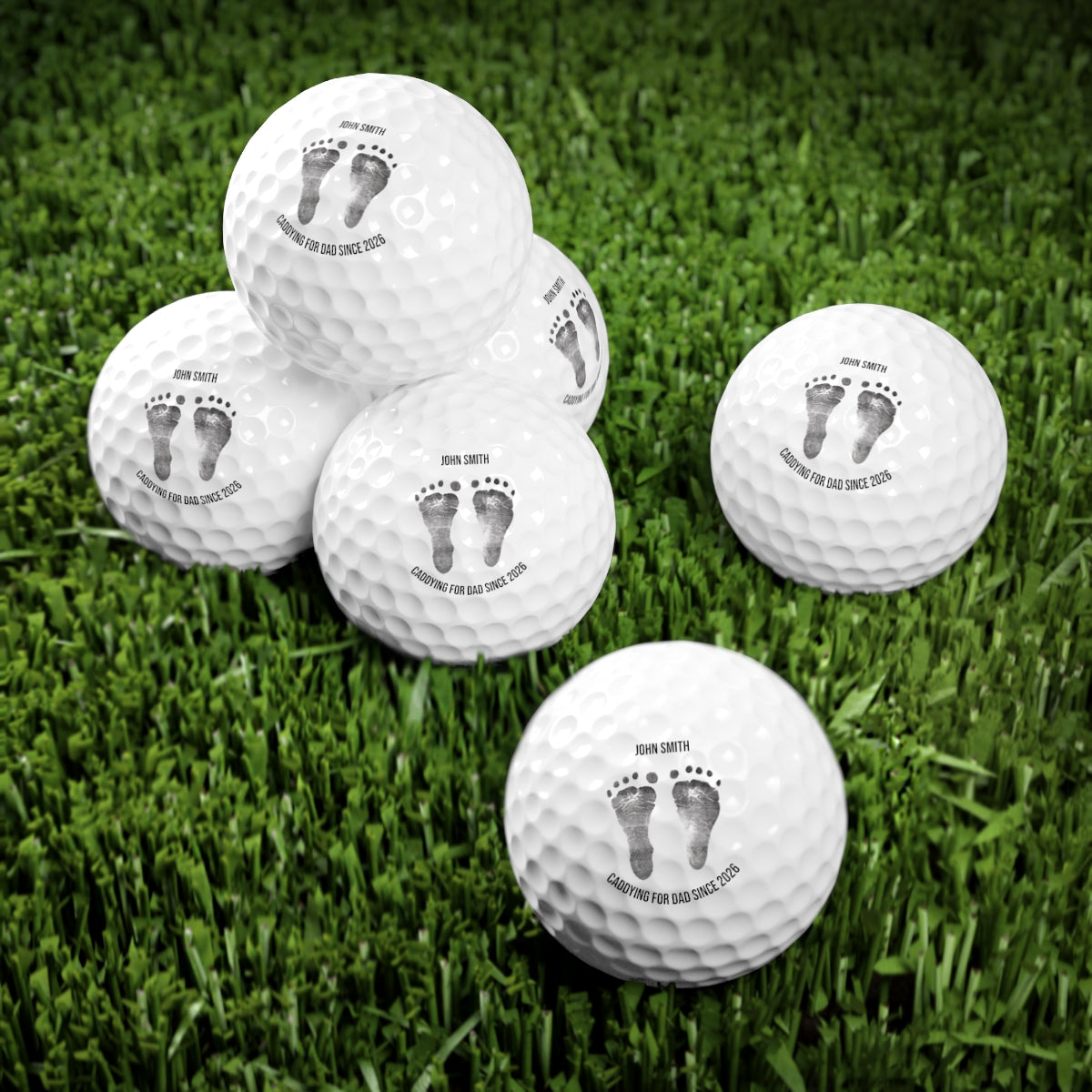 Custom golf ball keepsake with baby's footprint on it.