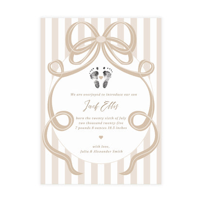 Baby footprint announcement card with neutral bow and stripes