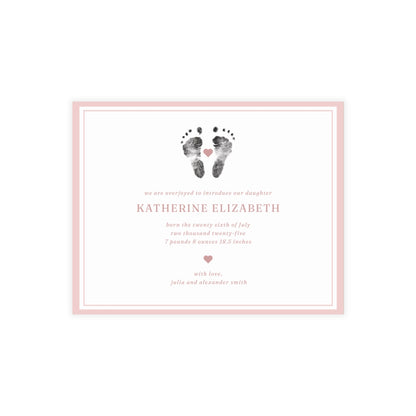 Newborn baby announcement card with footprints and text on a white background