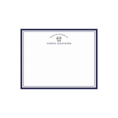 White card with baby footprints, blue border and text on a white background