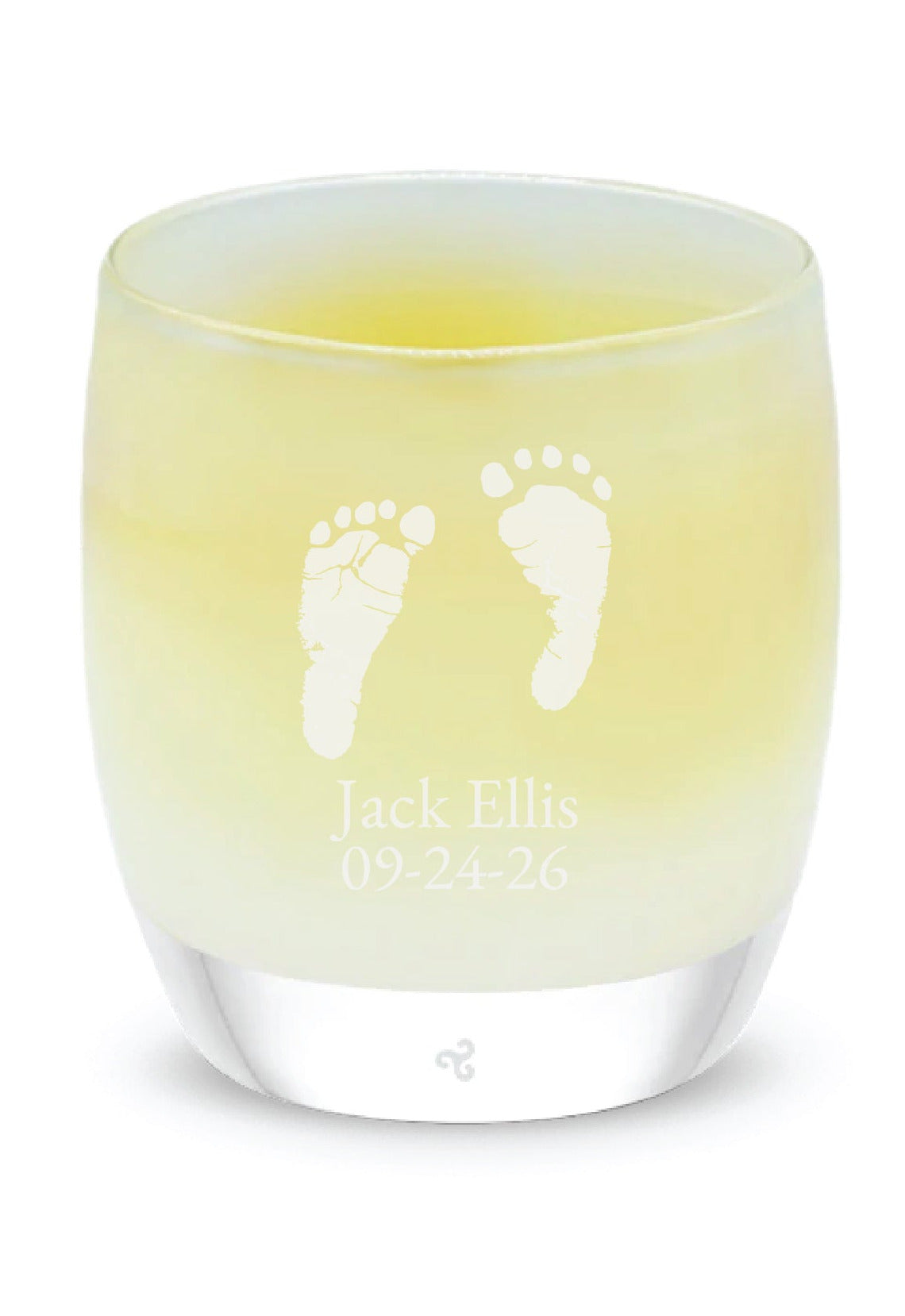 Glassybaby candle with footprints on a white background