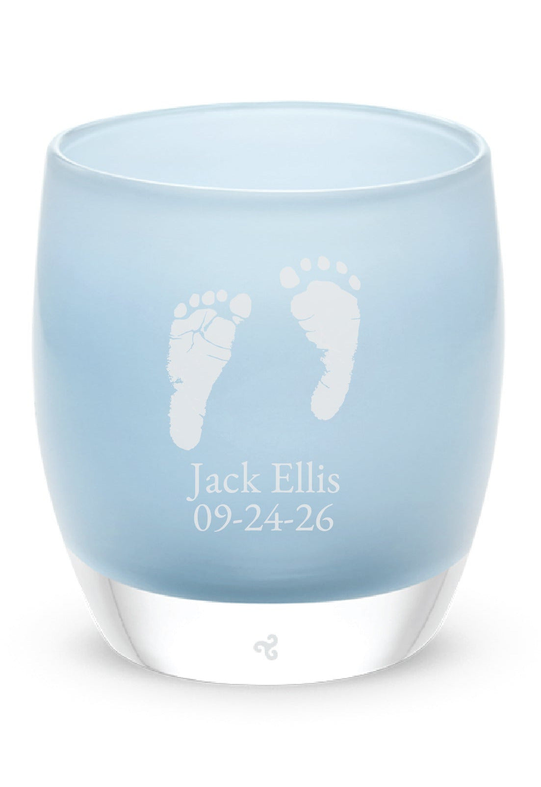 Glassybaby tea light holder with engraved baby feet and name on a white background