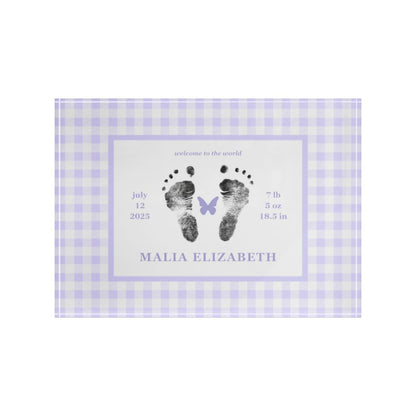 Purple acrylic block with  baby footprints and text.