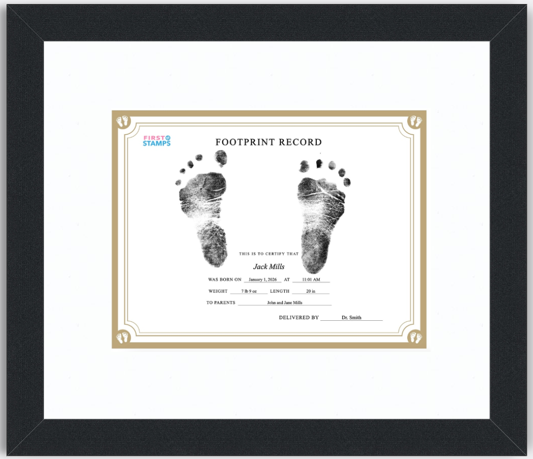 Framed baby footprint record with black and white footprints on a white background